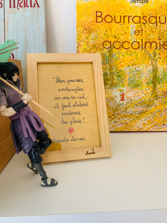 Cadre en bois : "Pour pouvoir contempler un arc-enciel, il faut d'abord endurer la pluie"