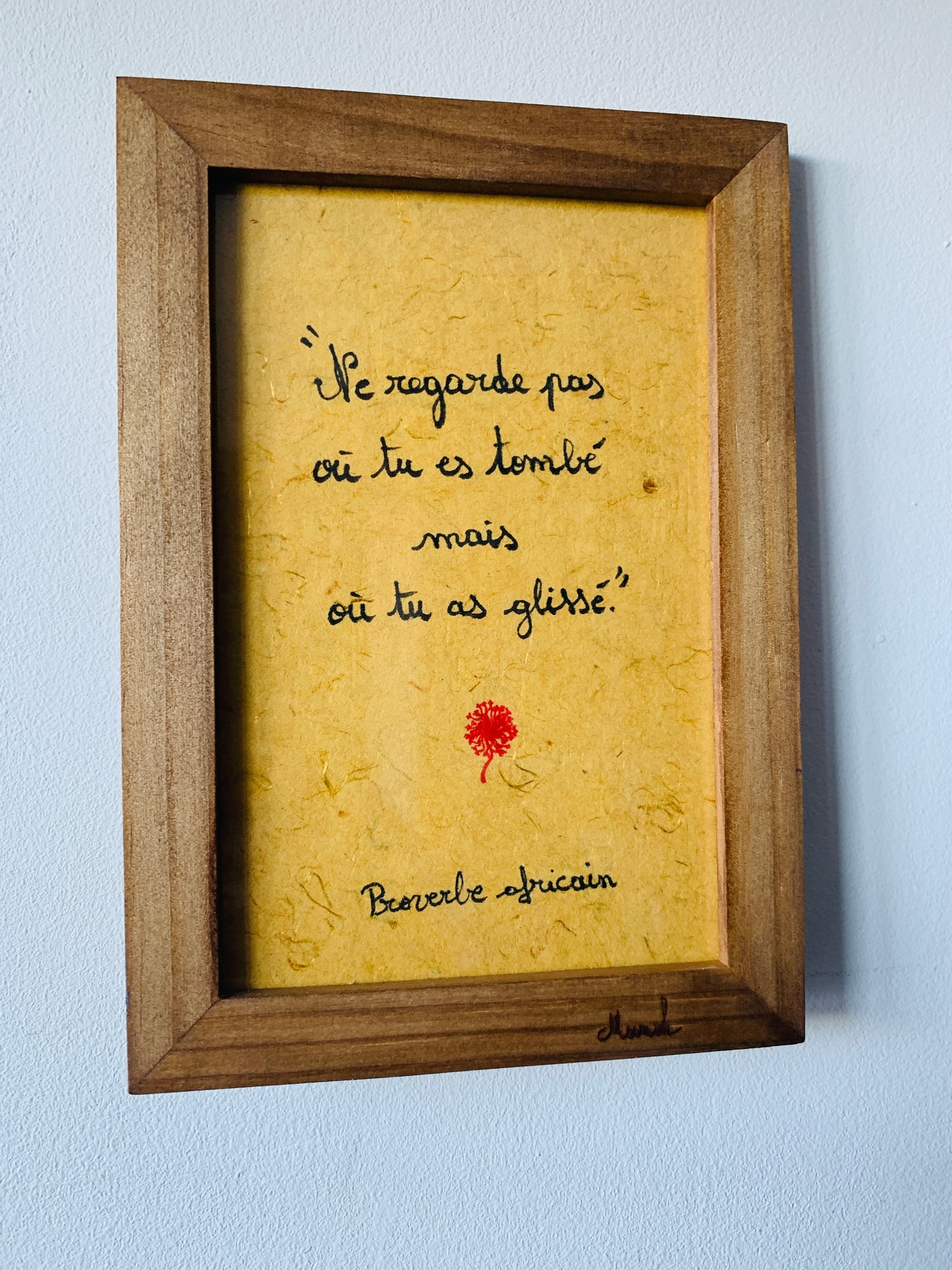 Cadre en bois :"Ne regarde pas où tu es tombé mais où tu as glissé"