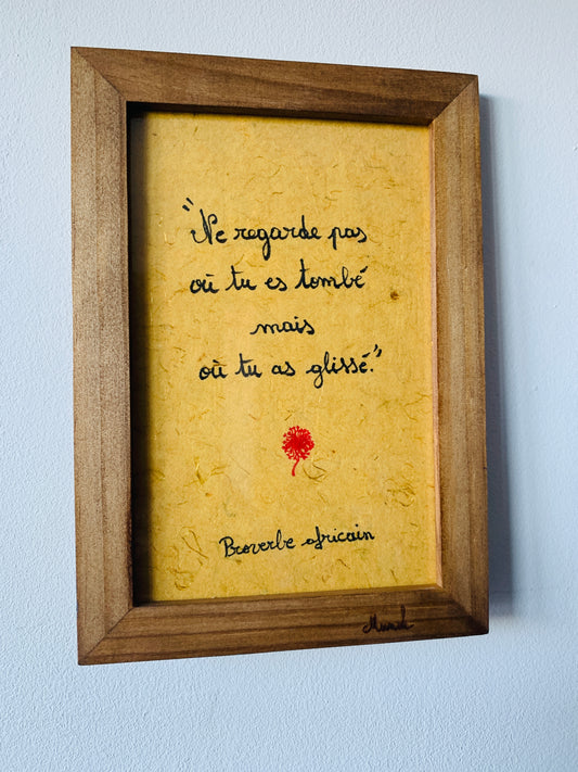 Cadre en bois :"Ne regarde pas où tu es tombé mais où tu as glissé"
