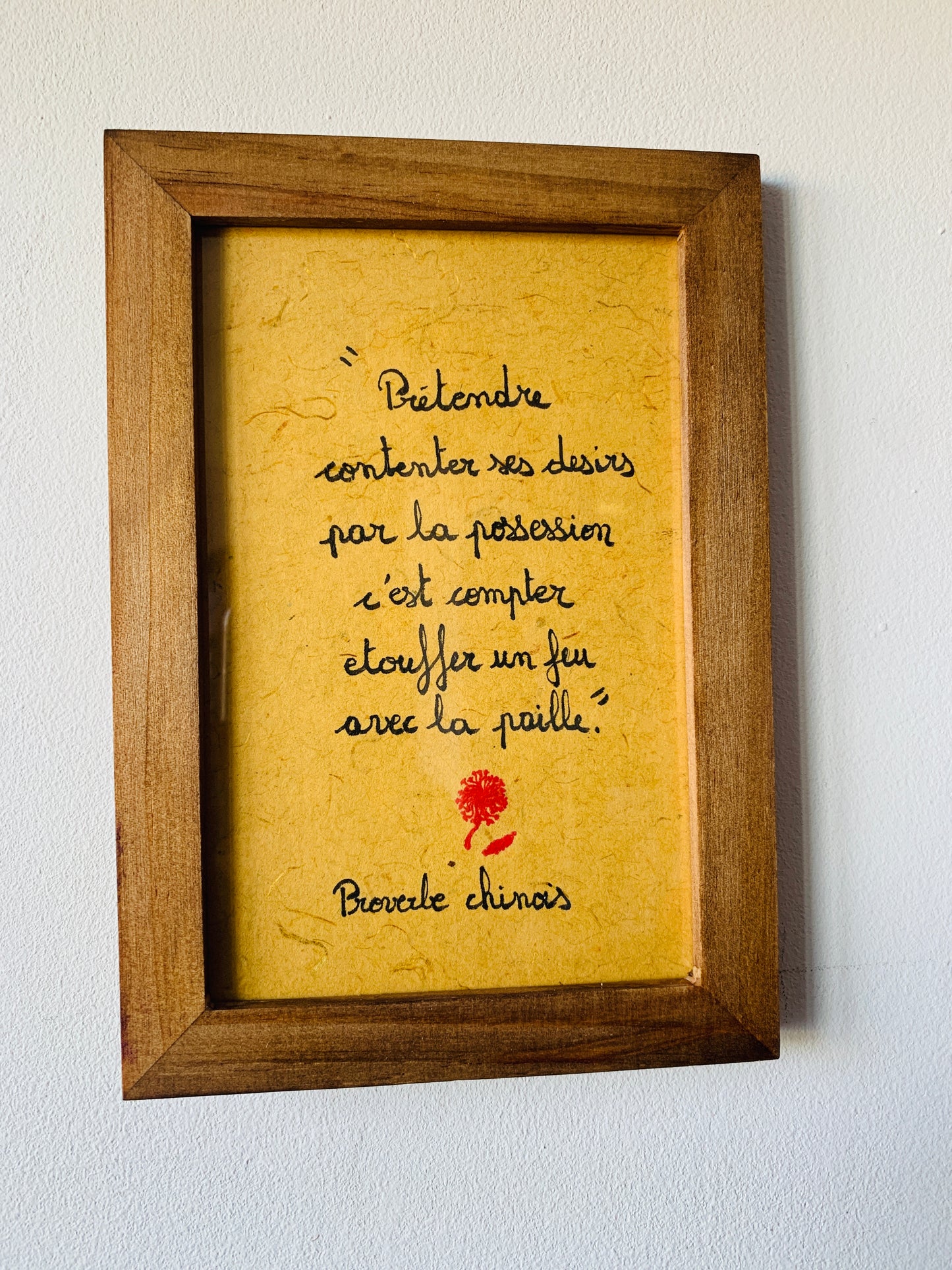 Cadre en bois : "Prétendre contenter ses desirs par la possession..."