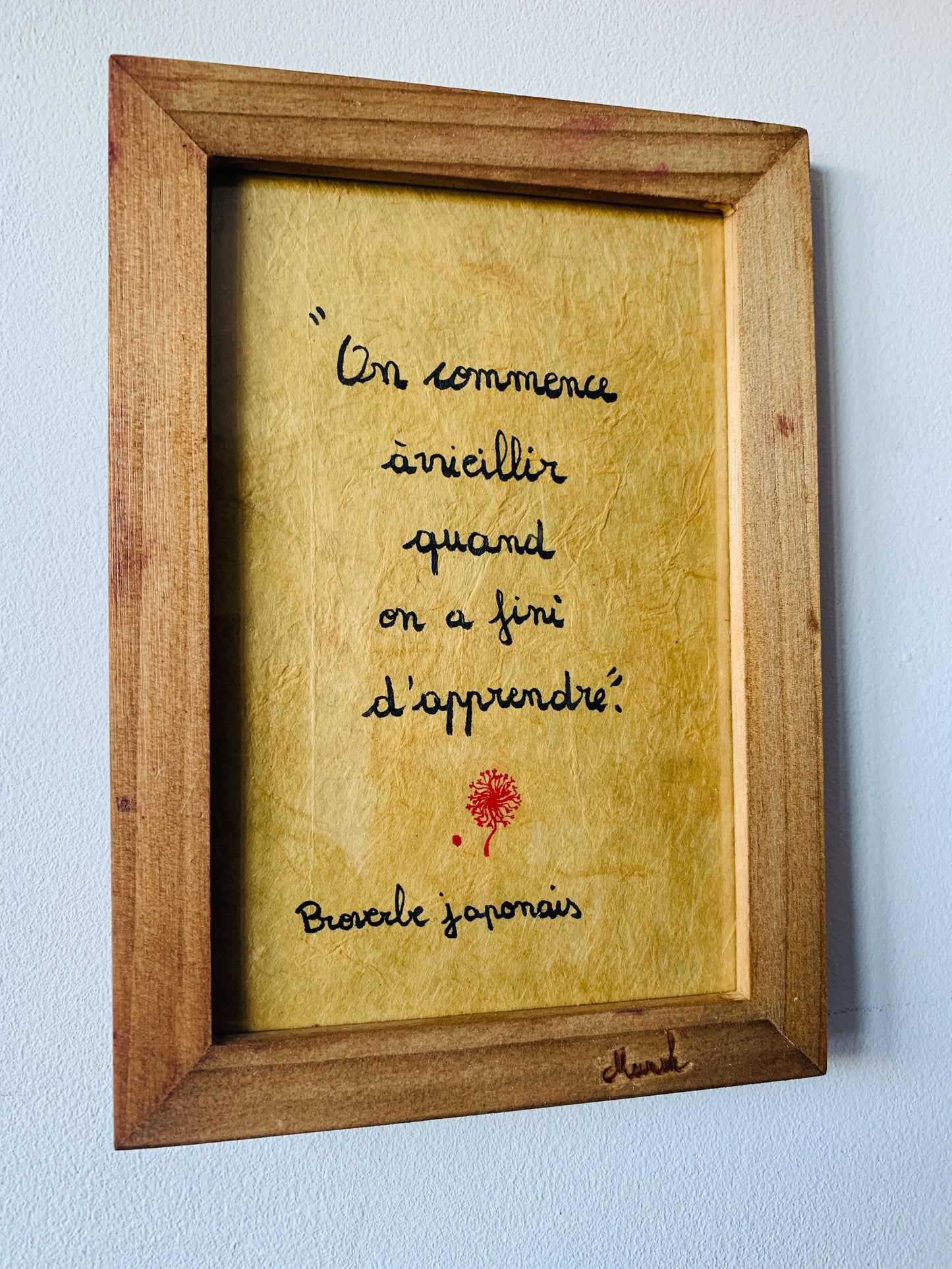 Cadre en bois : "On commence à vieillir quand on a fini d'apprendre"
