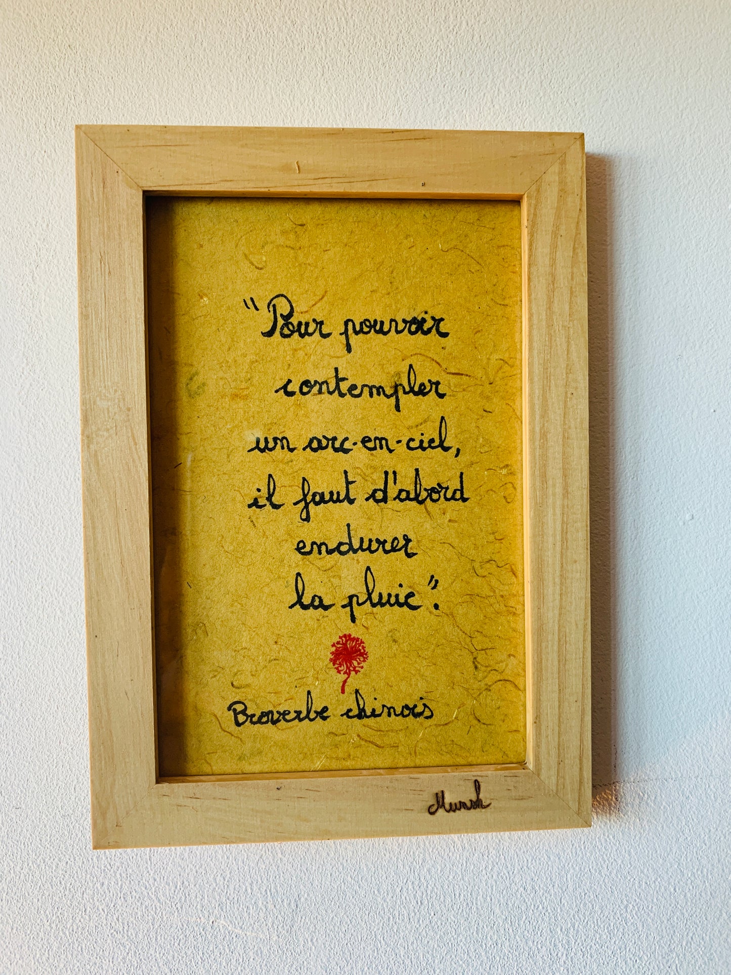 Cadre en bois : "Pour pouvoir contempler un arc-enciel, il faut d'abord endurer la pluie"