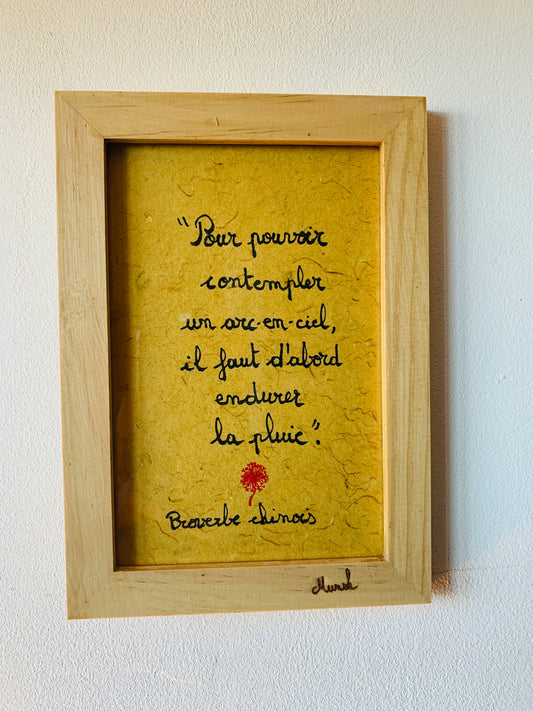 Cadre en bois : "Pour pouvoir contempler un arc-enciel, il faut d'abord endurer la pluie"