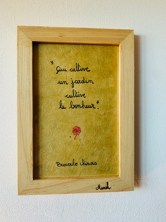 Cadre en bois : " Qui cultive un jardin cultive le bonheur "